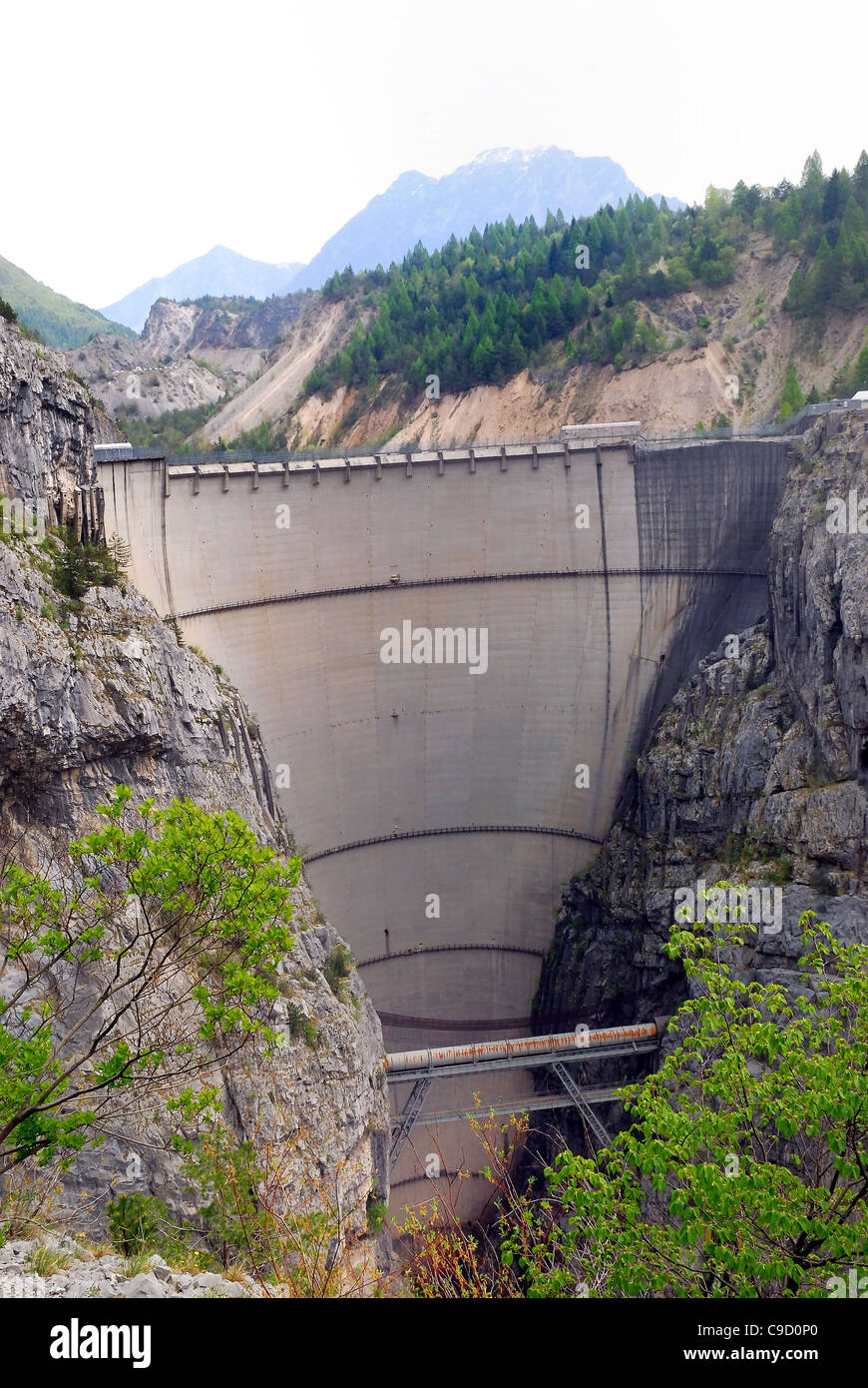 The Vajont Dam. The night of October, 9, 1963 a landslide caused a huge wave that went over the dam and fell into the valley. Stock Photo