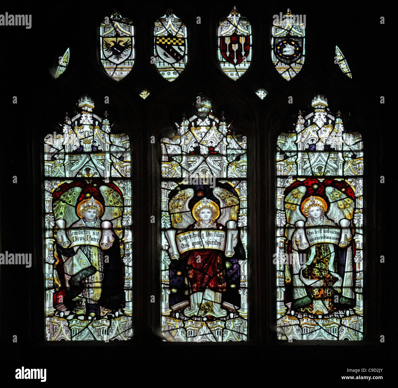 Stained glass window by the Kempe Studios depicting three angels, St