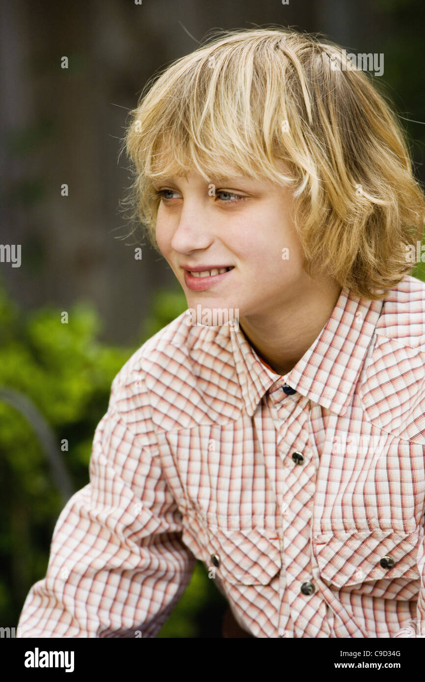Close-up of a teenage boy smiling Stock Photo - Alamy