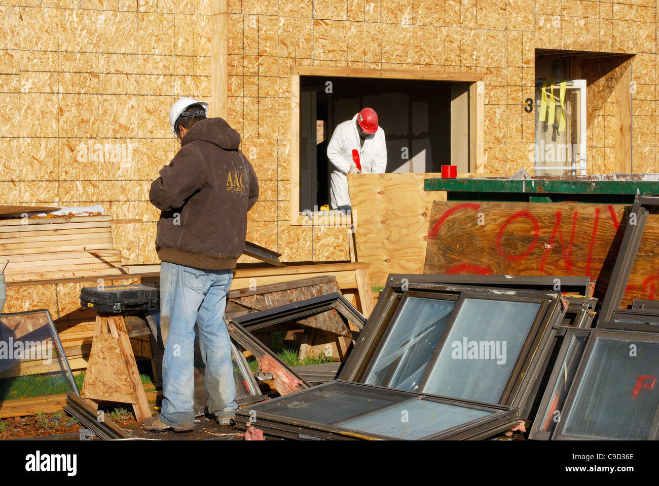 Construction worker remove old windows stock photo alamy