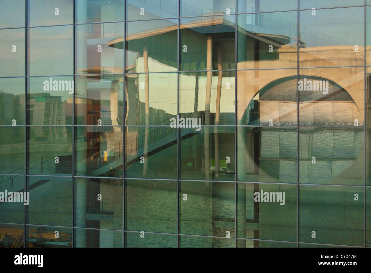 Reflection of Marie Elisabeth Lueders House in glass facade of Paul Loebe House, Berlin, Germany. Stock Photo