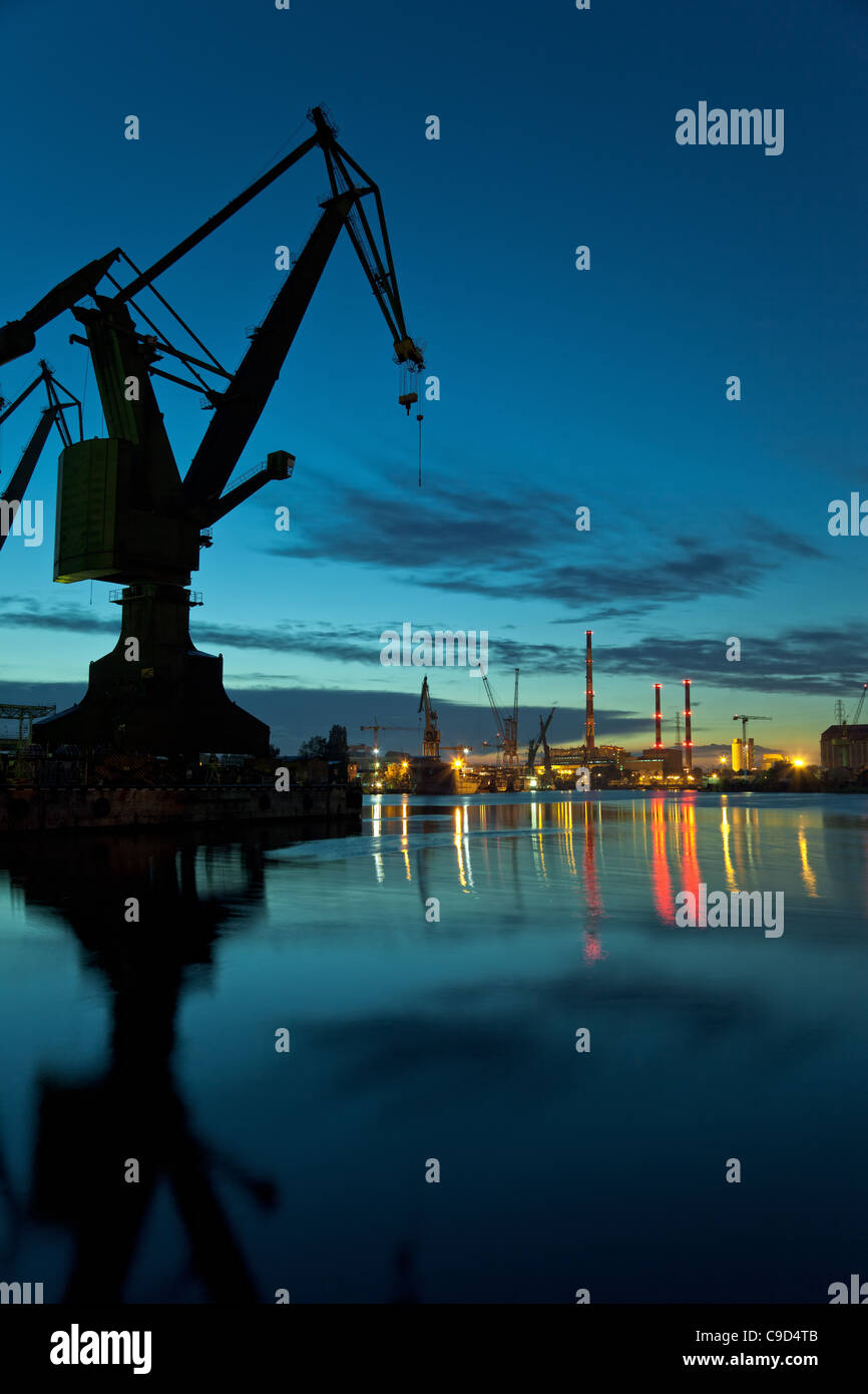 Industrial view at night in shipyard of Gdansk, Poland. Stock Photo