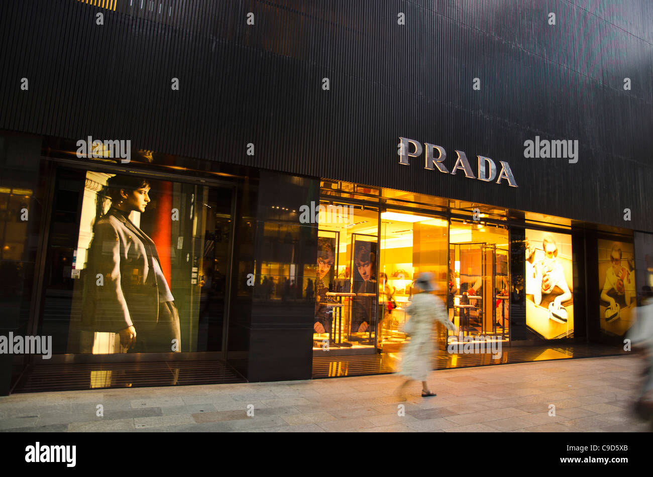 Japan, Honshu, Tokyo, Ginza, shopper walking by the Prada store on  Chou-dori Avenue Stock Photo - Alamy