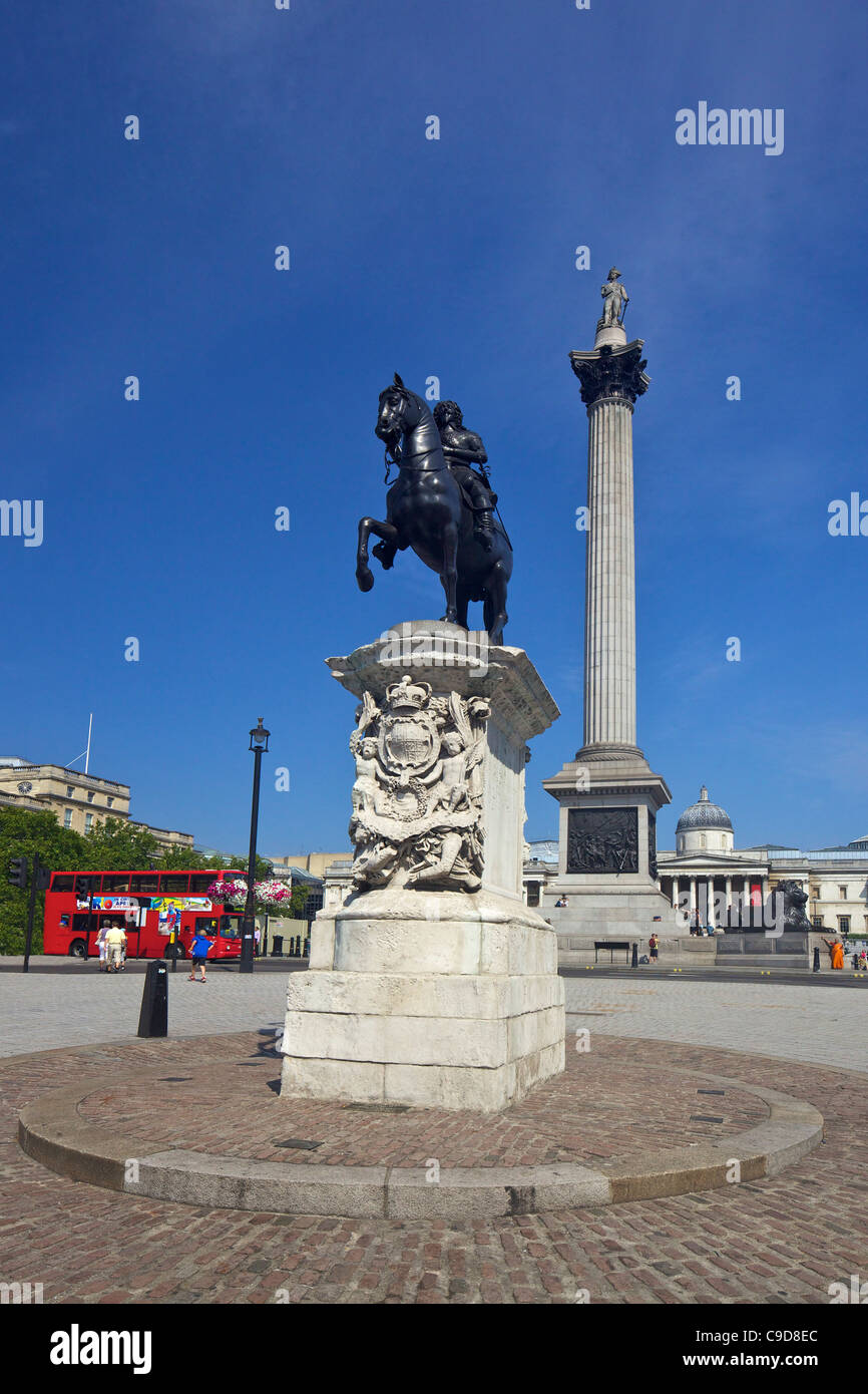 Equestrian statue of Charles I and Nelson's Column in Trafalgar Square, summer sunshine, London,  England, UK, United Kingdom, Stock Photo