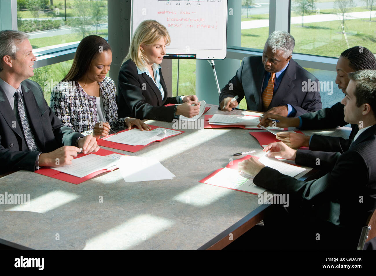Diverse male female colleague desks hi-res stock photography and images ...