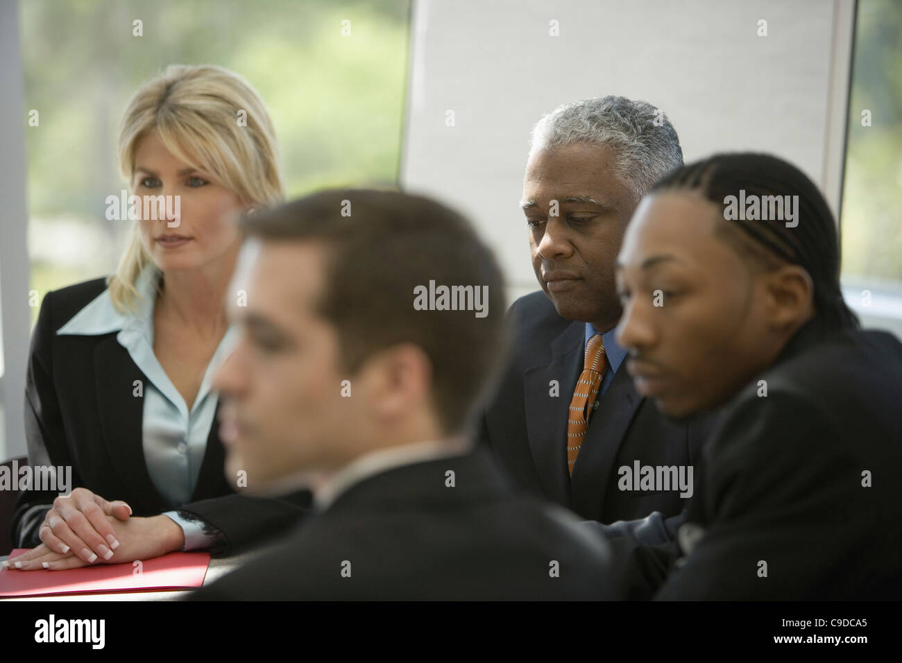 Diverse male female colleague desks hi-res stock photography and images ...