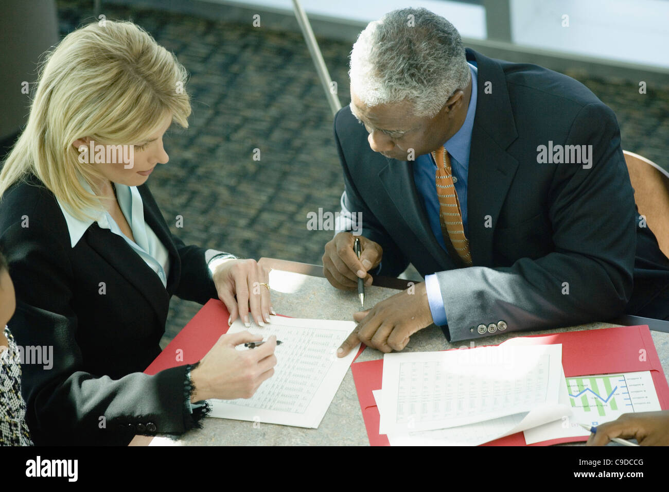 Chart Patterns Images Two colleagues reviewing chart hi-res stock photography and images - Alamy