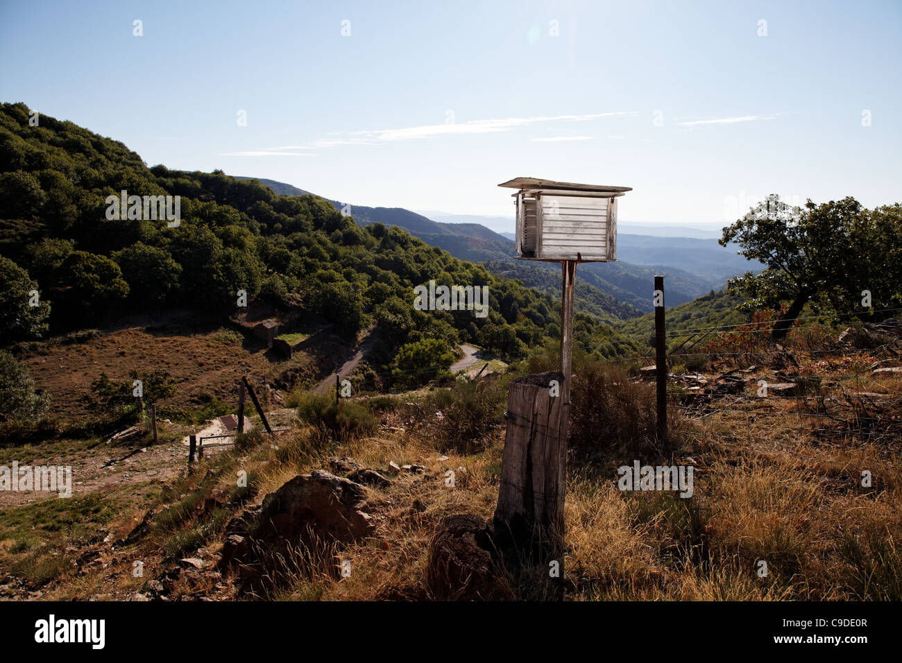 mail box in the middle of nowhere on top of a hill dominating a vast landscape. Cevennes, south of France Stock Photo