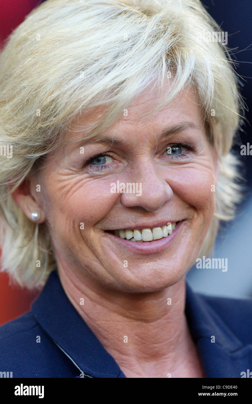 Germany head coach Silvia Neid smiles from the team bench before a FIFA Women's World Cup Group A match against France. Stock Photo