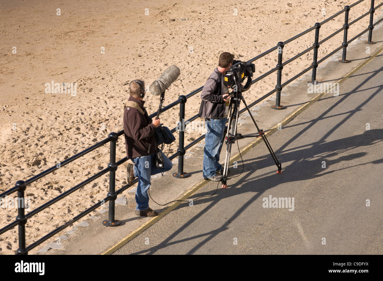 Llangrannog Llandysul Dyfed Beach and Sea Front Local TV Television crew filming Stock Photo