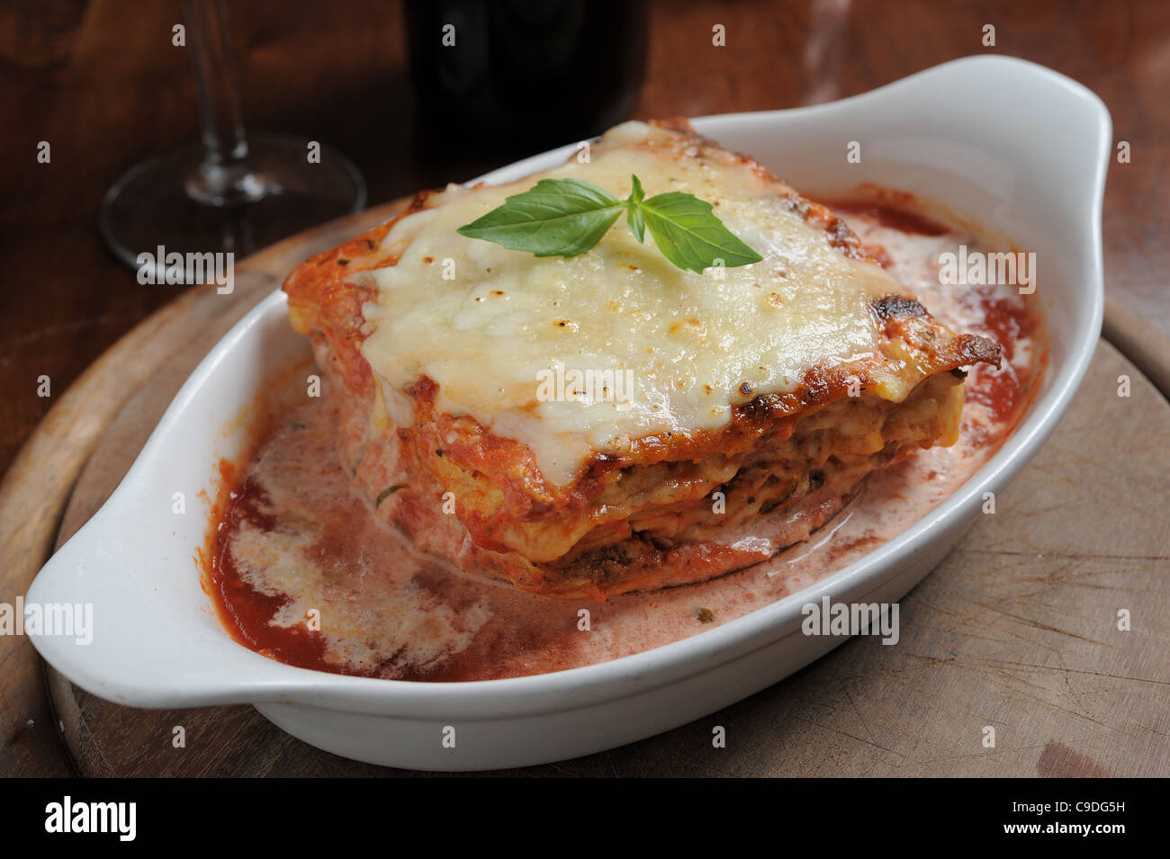 a serving of Cheese crusted lasagna Stock Photo