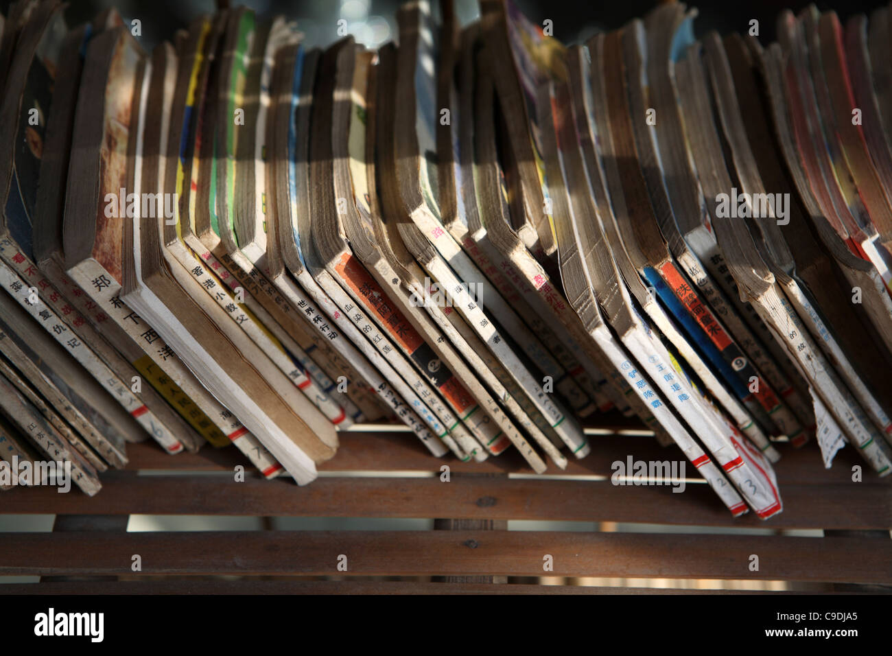 Vintage Chinese language comic books for sale, French Quarter, Shanghai market stall, China, Asia Stock Photo