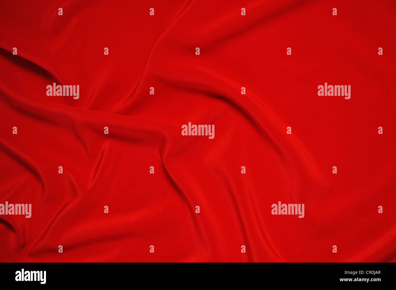 Red fabric background of socalled wet silk Stock Photo Alamy