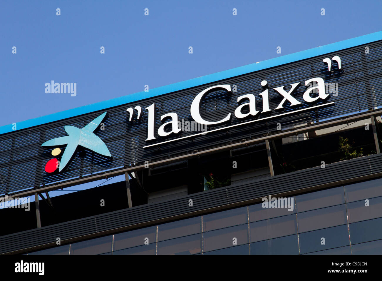 La caixa bank LOGO company banking financial city centre Palma de Mallorca Majorca espana spain Stock Photo