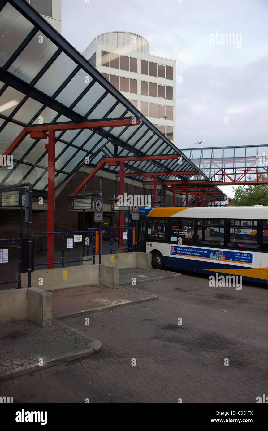 Buses at the bus stop in Swindon bus station Stock Photo
