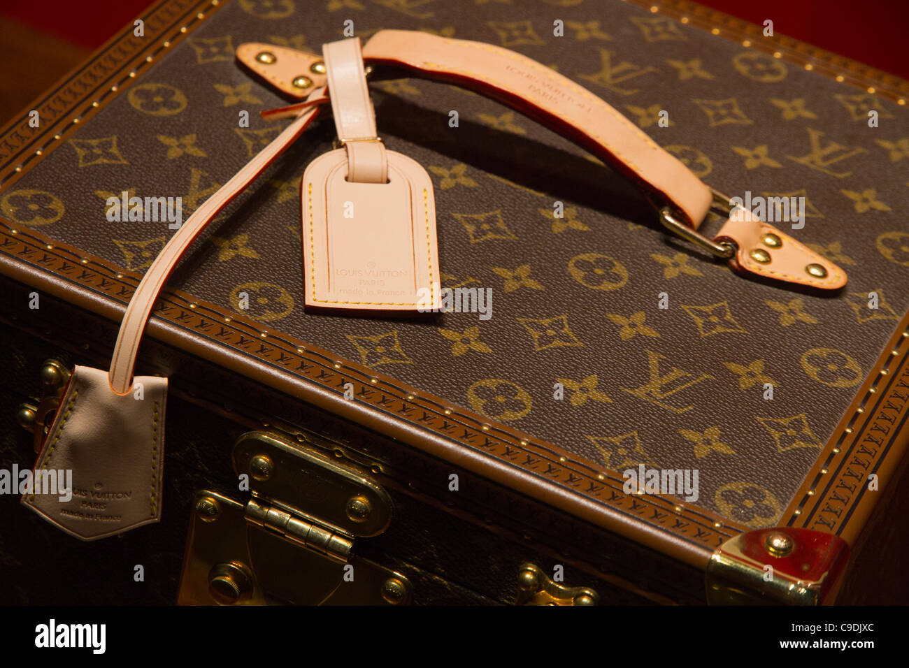 Louis Vuitton bag displayed in luxury shopping boutique storefront window in Palma de Mallorca