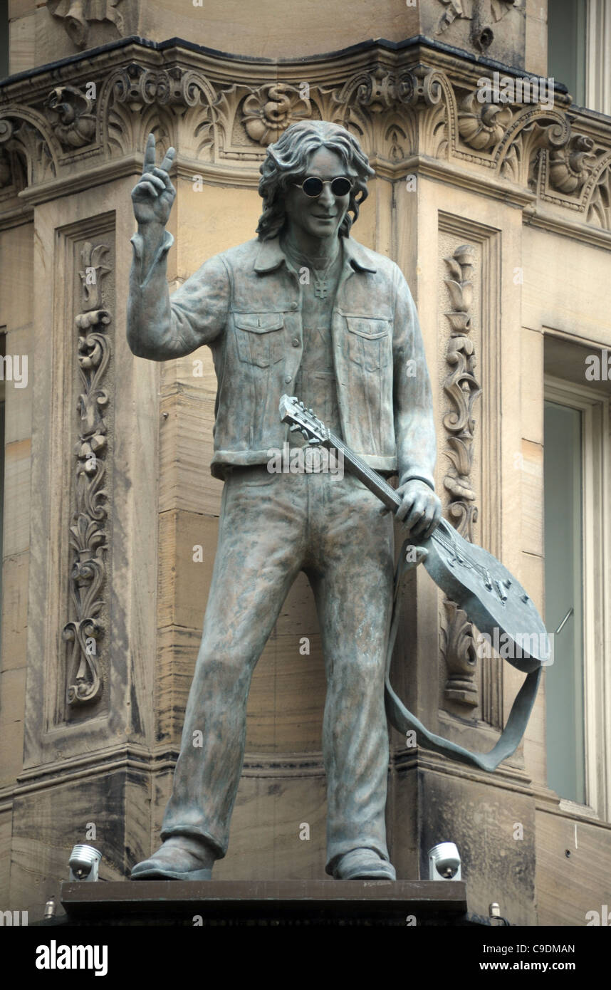John Lennon statue on a building in Liverpool, Merseyside, Britain, UK Stock Photo