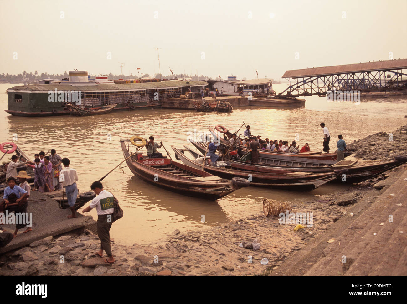 Yangon river scene, boats, public transportation Stock Photo Alamy