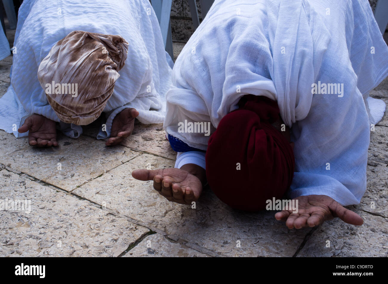 Ethiopian women take part in prayer as the Jewish Ethiopian community in Israel celebrates the Sigd Holiday, symbolizing their yearning for Jerusalem, at the Sherover Promenade overlooking the Temple Mount. Jerusalem, Israel. 24th November 2011. Stock Photo