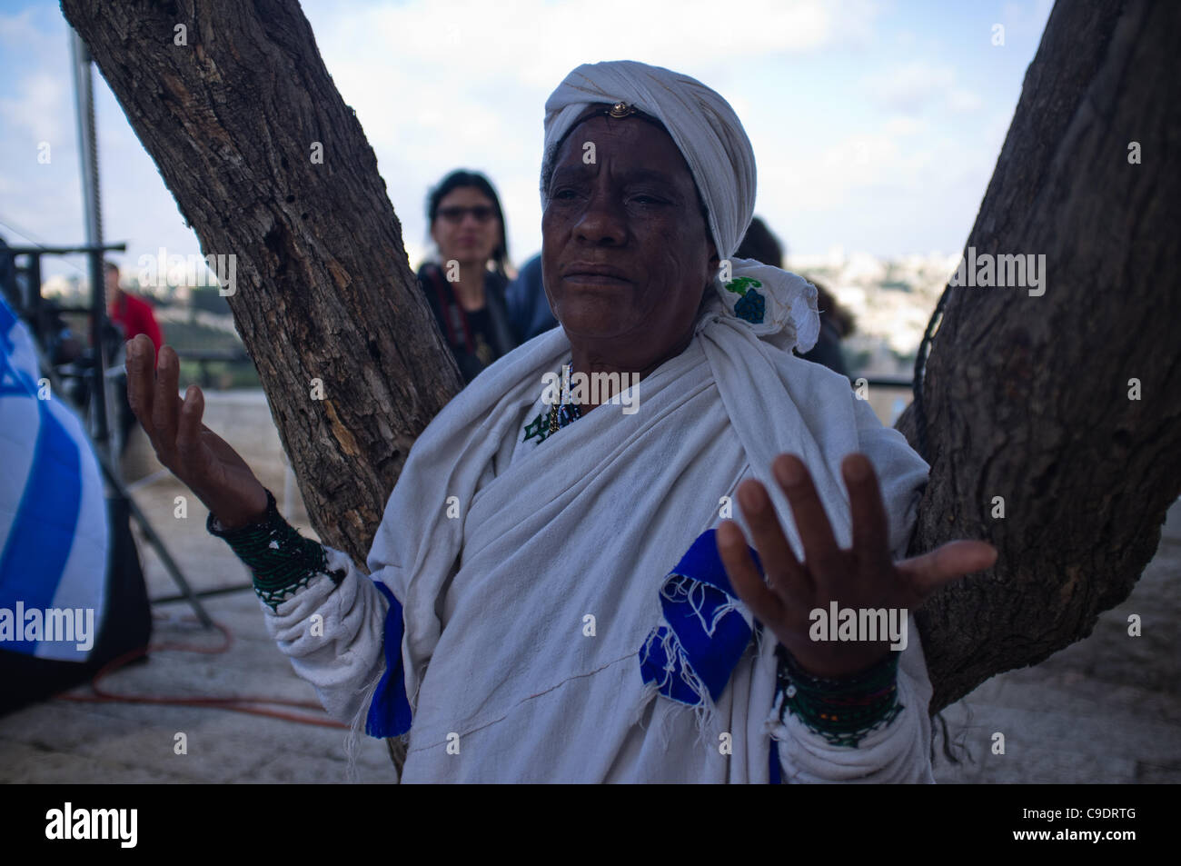 An Ethiopian Woman Takes Part In Prayer As The Jewish Ethiopian Community In Israel Celebrates 