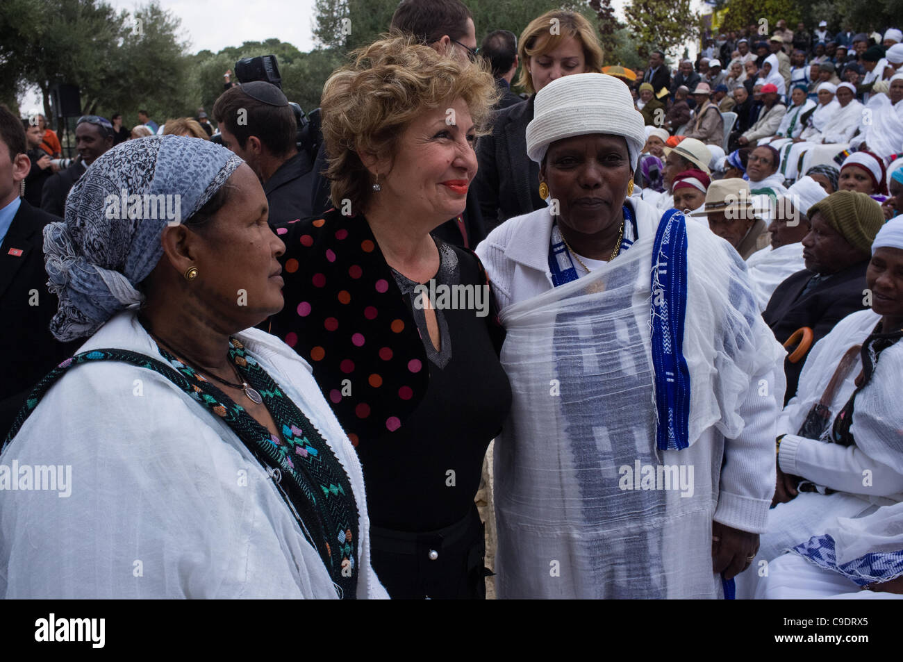 Minister of Immigrant Absorption, Ms. Sofa Landver, poses with women for photo during the Jewish Ethiopian community celebration of the Sigd Holiday at the Sherover Promenade overlooking the Temple Mount. Jerusalem, Israel. 24th November 2011. Stock Photo