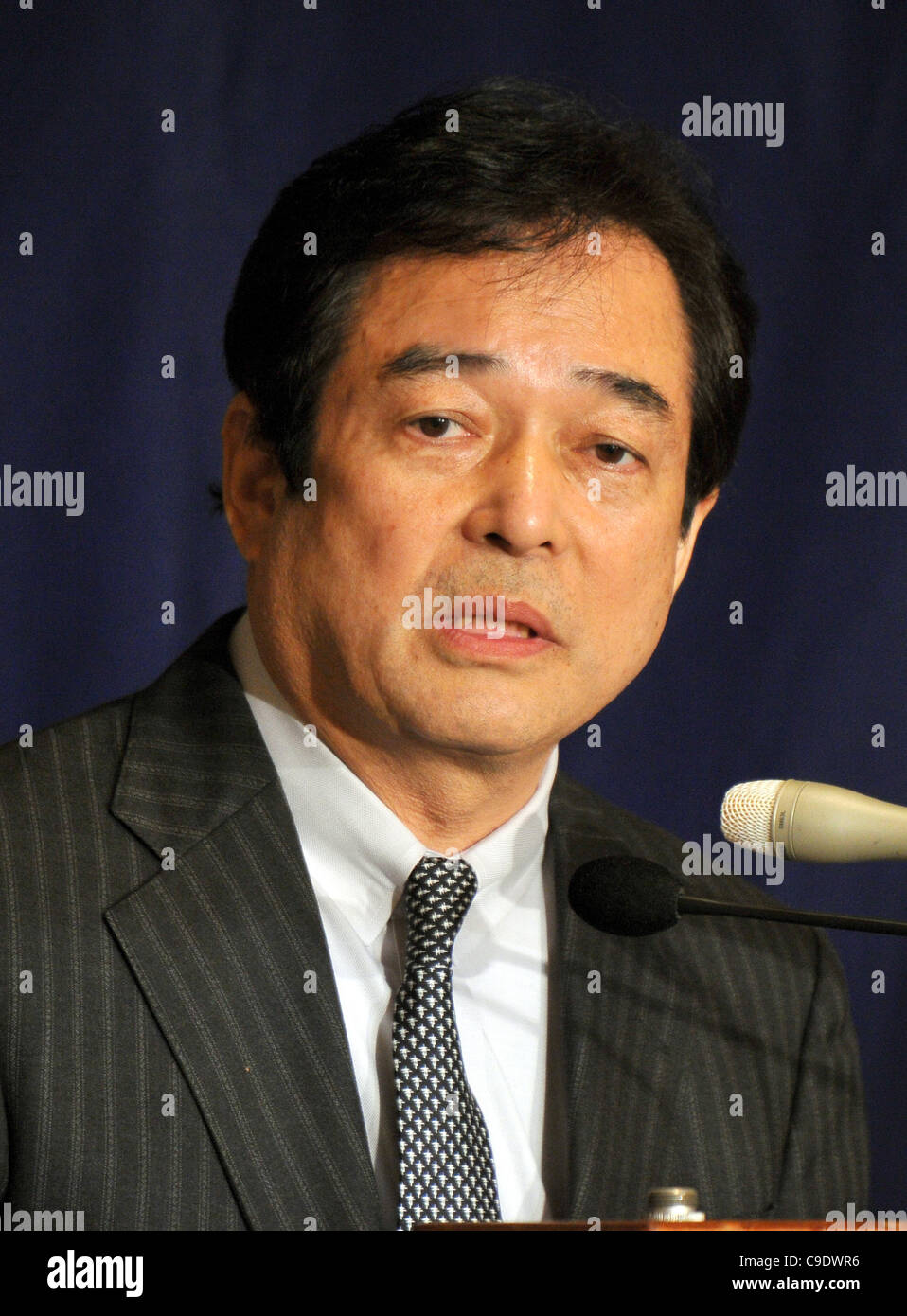 TOKYO, Japan - Hidetoshi Kiyotake, former general manager of the Yomiuri  Giants professional baseball club, speaks at a press conference in Tokyo on  Dec. 18, 2014, after the Tokyo District Court ordered
