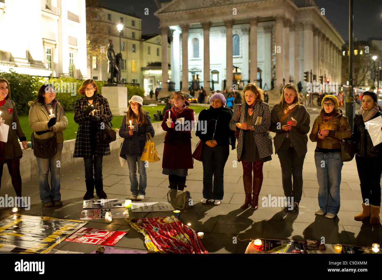 25 Nov Trafalgar Square, London. Million Women Rise campaign organise a candle light vigil as part of the UN International Day For The Elimination of Violence Against Women. Global violence against women is increasing and needs to be brought to the attention of people and governments. Stock Photo