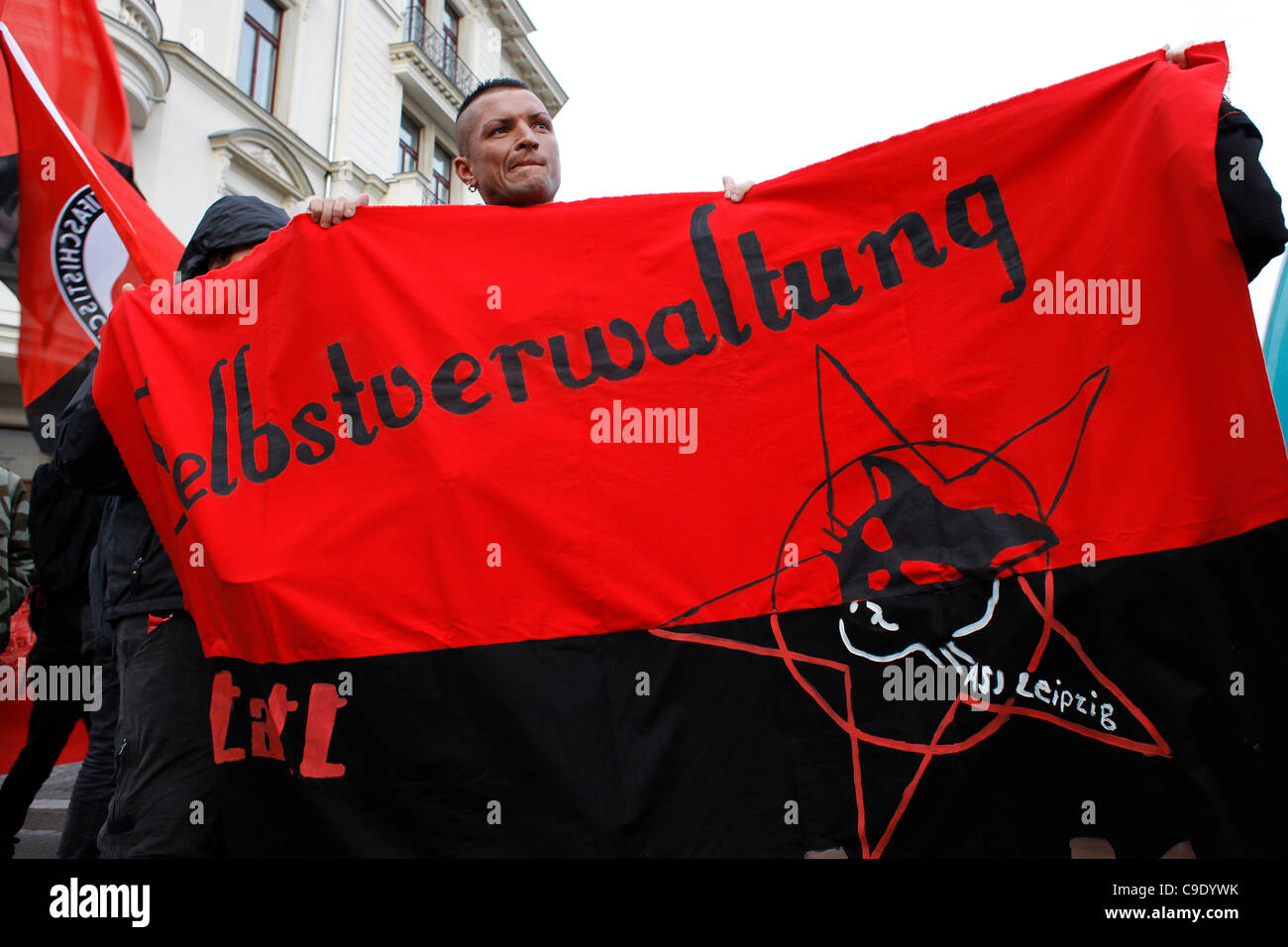 Anti-Fascist participants marching during a rally against right-wing extremism and center of far-right NPD party located in Leipzig Germany Stock Photo