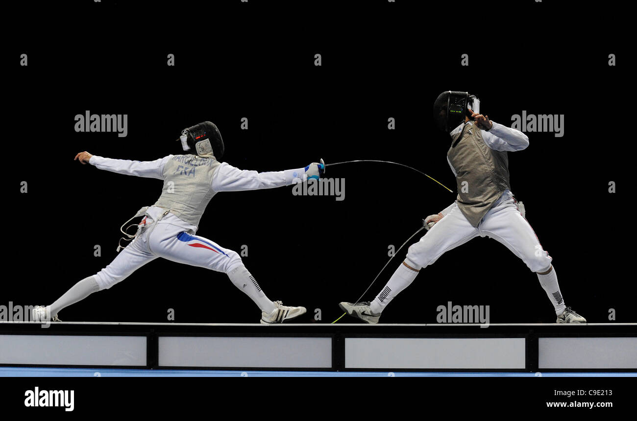 Marcel MARCILLOUX (FRA) [left] v Husayn ROSOWSKY (GBR) [right] during the men's foil competition at the London Prepares Olympic Test Event, ExCel Centre,  London, England November 27, 2011. Stock Photo