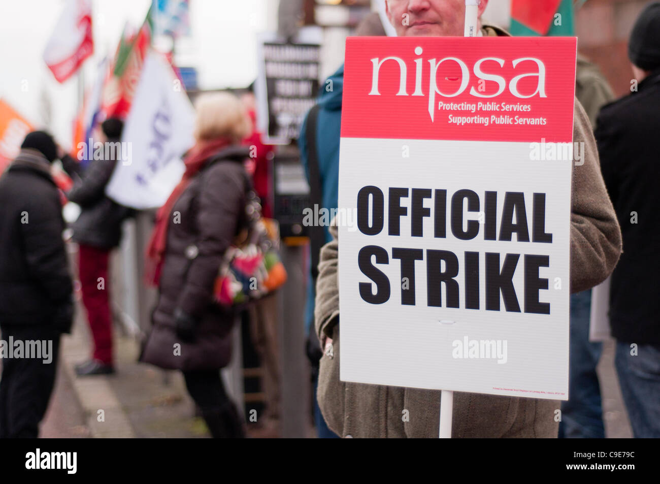 Workers from Translink form a picket line during a one-day public sector strike. BELFAST 30/11/2011 Stock Photo