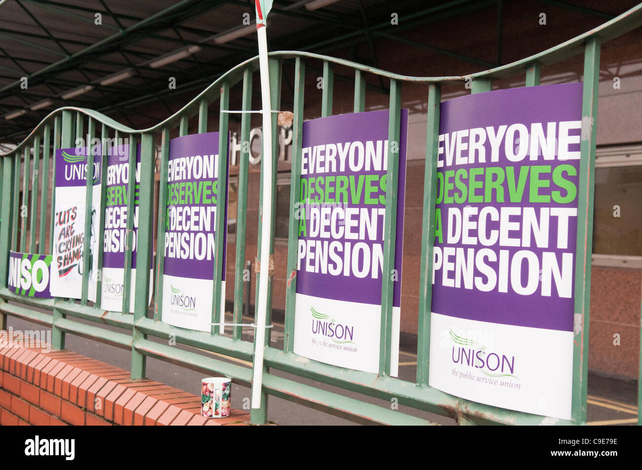 Posters outside the Mater Hospital as workers form a picket line during a one-day public sector strike. BELFAST 30/11/2011 Stock Photo