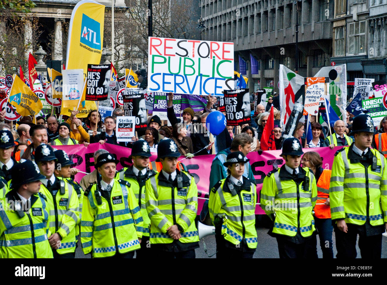 London, UK. 30th Nov, 2011. Thousands of striking public sector workers march through the streets of London in protest at Government plans for pension reform. It is estimated that as many as two million public sector workers took part in the strikes across the UK Stock Photo