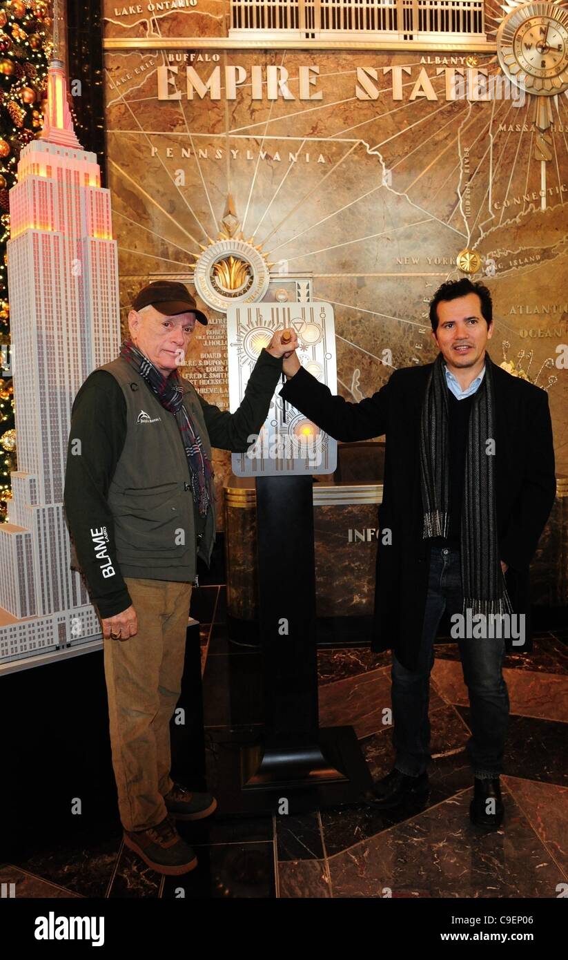 Dec. 9, 2011 - Manhattan, New York, U.S. - RIC O'BARRY, star of ''The Cove'' and JOHN LEGUIZAMO. Actor John Leguizamo and the Academy Award winning team from ''The Cove'' light the Empire State Building red to raise awareness for the protection of dolphins in Taiji, Japan. (Credit Image: © Bryan Smi Stock Photo