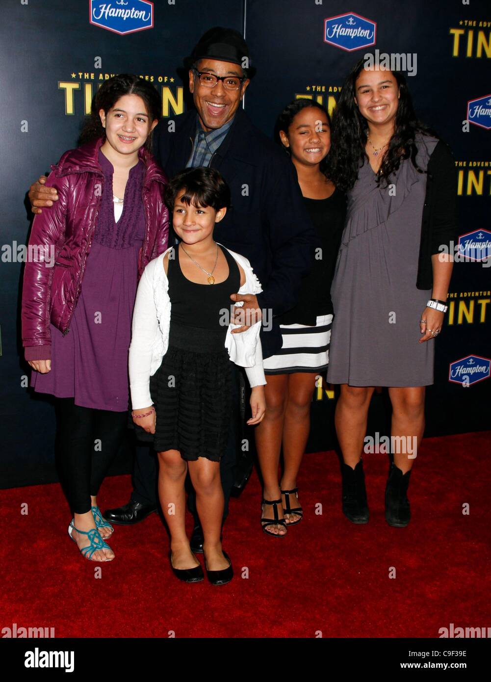 Giancarlo Esposito, family at arrivals for The Adventures of Tin Tin Premiere, The Ziegfeld