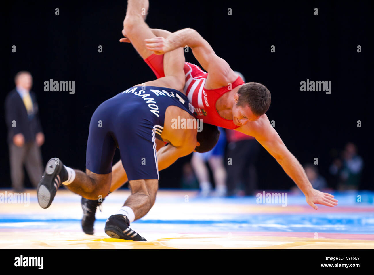 J HASANOV v G WOLLER in the Men's Bronze 66kg Freestyle Wrestling