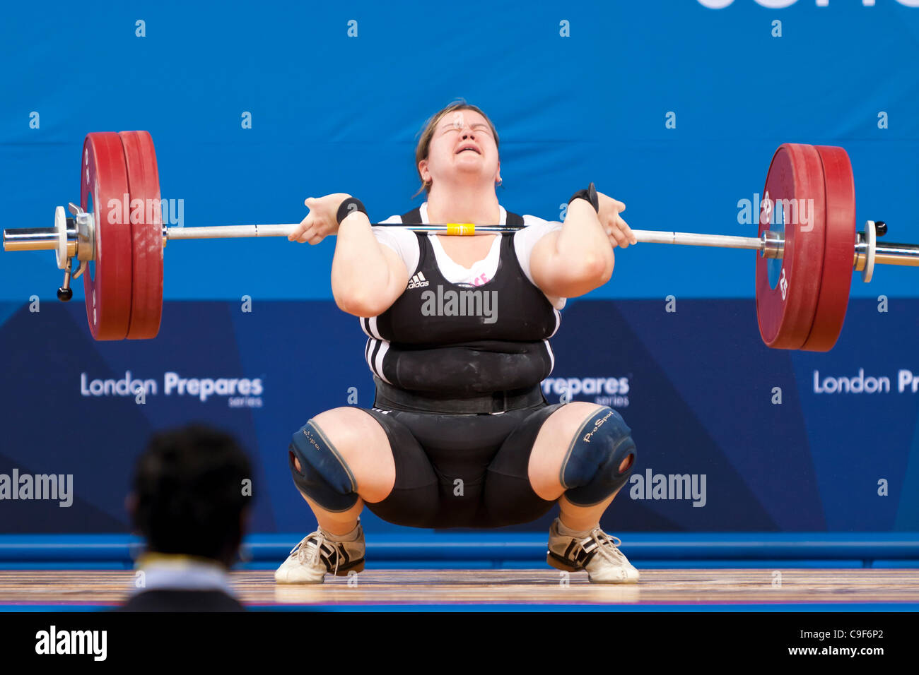 Woman weight lifting barbell uk hi res stock photography and images Alamy