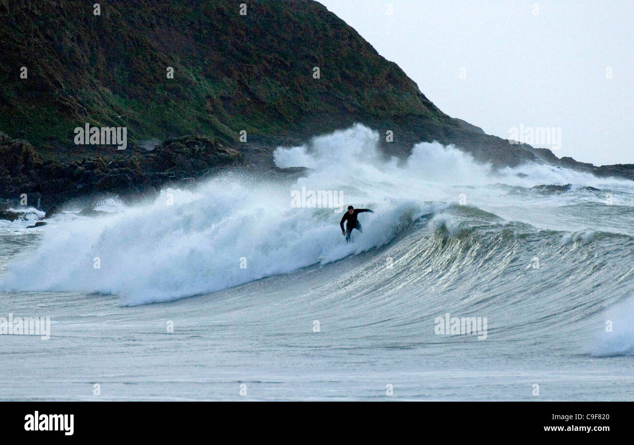 13th Dec 2011 Swansea, UK Surfers making the most of the heavy surf