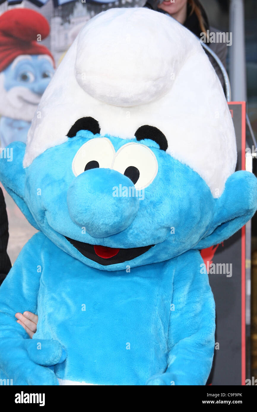 CLUMSY THE SMURFS HONORED WITH HAND AND FOOTPRINTS HOLLYWOOD LOS ANGELES CALIFORNIA USA 13 December 2011 Stock Photo