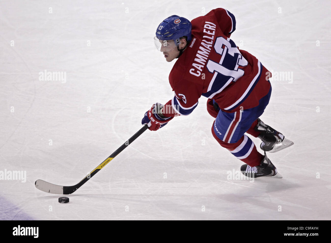 Dec. 13, 2011 - Montreal, Quebec, Canada - Montreal Canadiens forward Michael Cammalleri(13) carries the puck in third period action during the Montreal Canadiens' game against the New-York Islanders at Bell Center. Montreal won 5-3. (Credit Image: © Phillippe Champoux/Southcreek/ZUMAPRESS.com) Stock Photo