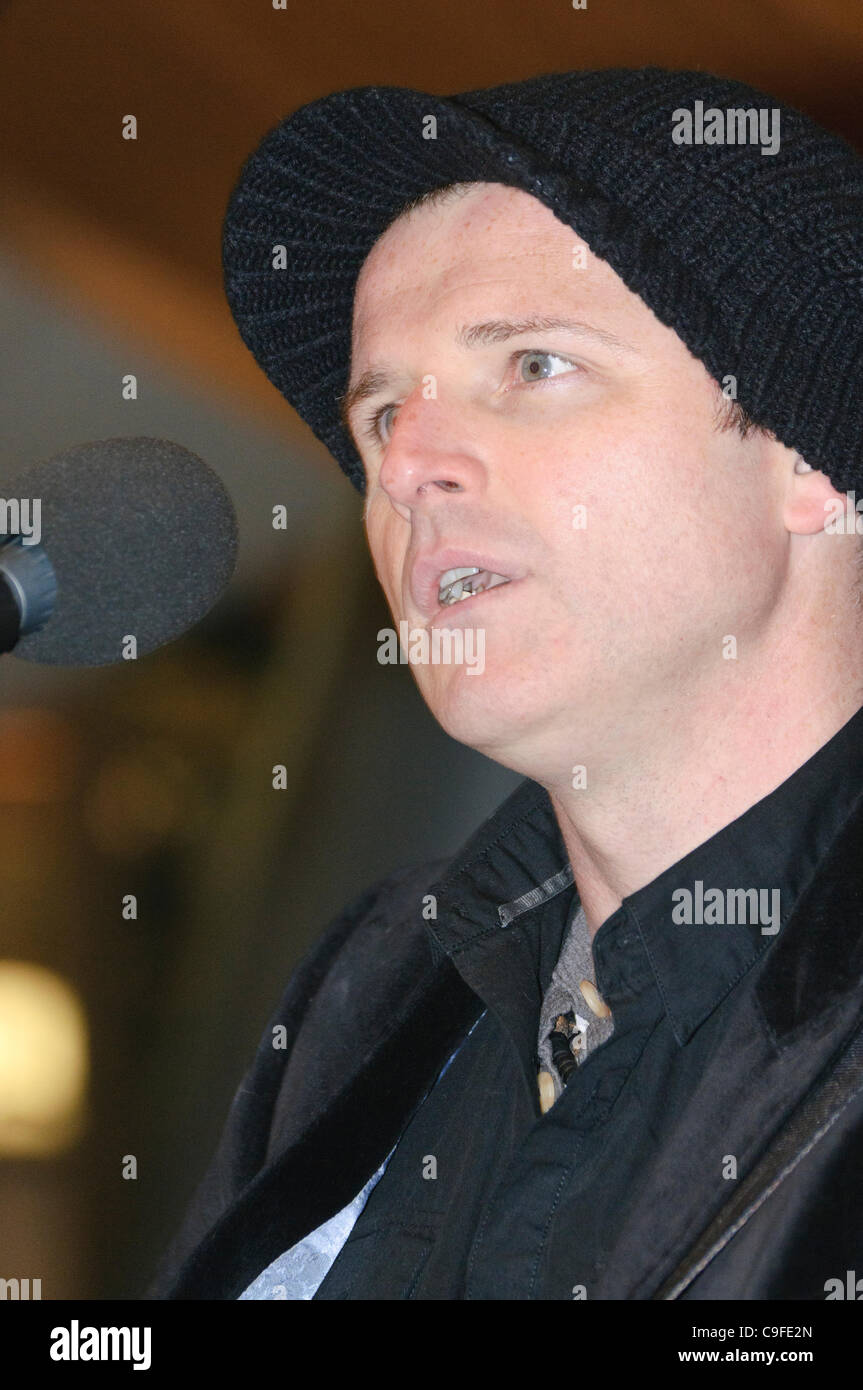 Belfast, 14/12/2011: Ciaran Gribbin, lead singer with the Austrialian band INXS, sings on the Alan Simpson radio show from Victoria Square Stock Photo