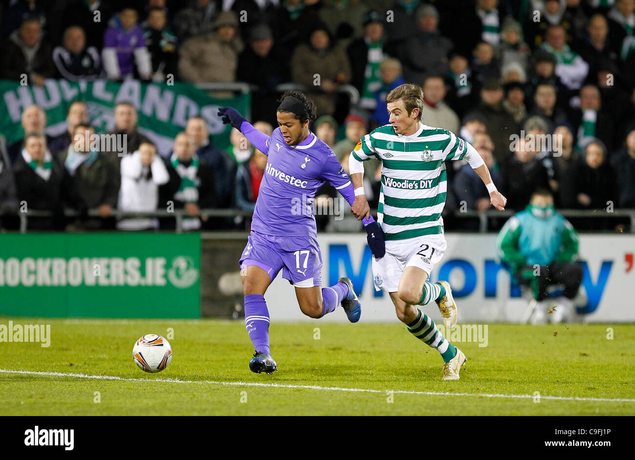 15.12.2011 Tallaght Stadium, Dublin, Ireland. Giovani dos Santos (Tottenham Hotspur)  charges towards the box chased by Ronan Finn (Shamrock Rovers)  during the Europa League game between Shamrock Rovers and Tottenham Hotspur. Stock Photo