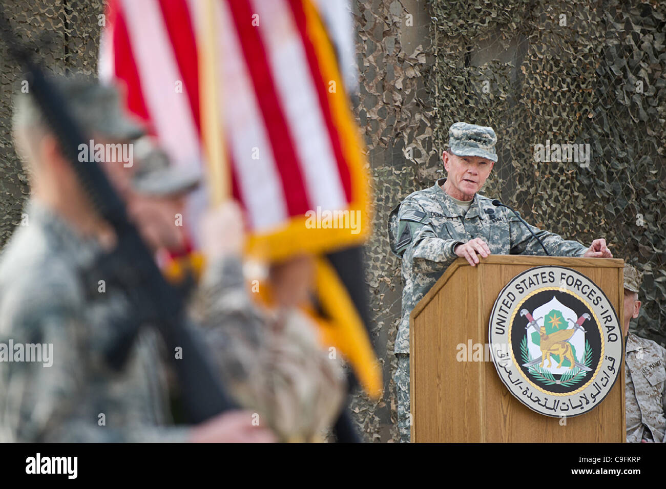 US Chairman of the Joint Chiefs of Staff Army General Martin E. Dempsey speaks to US military forces during the end of mission ceremony December 15,, 2011 in Baghdad, Iraq. The ceremony officially ends the Iraq war after more than eight years of combat. Stock Photo