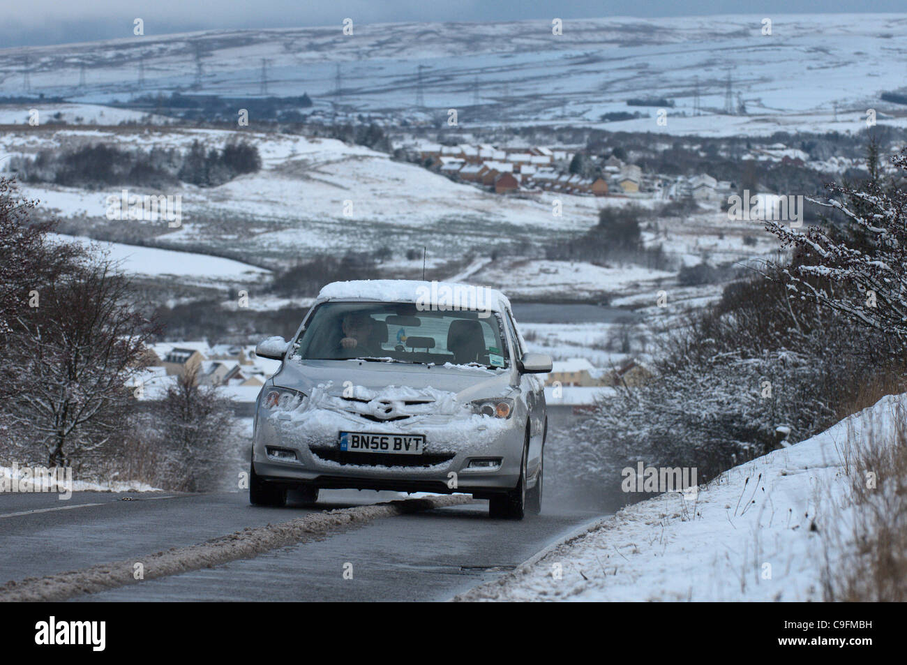 A car takes a road out of Brynmawr, the highest town in Wales The