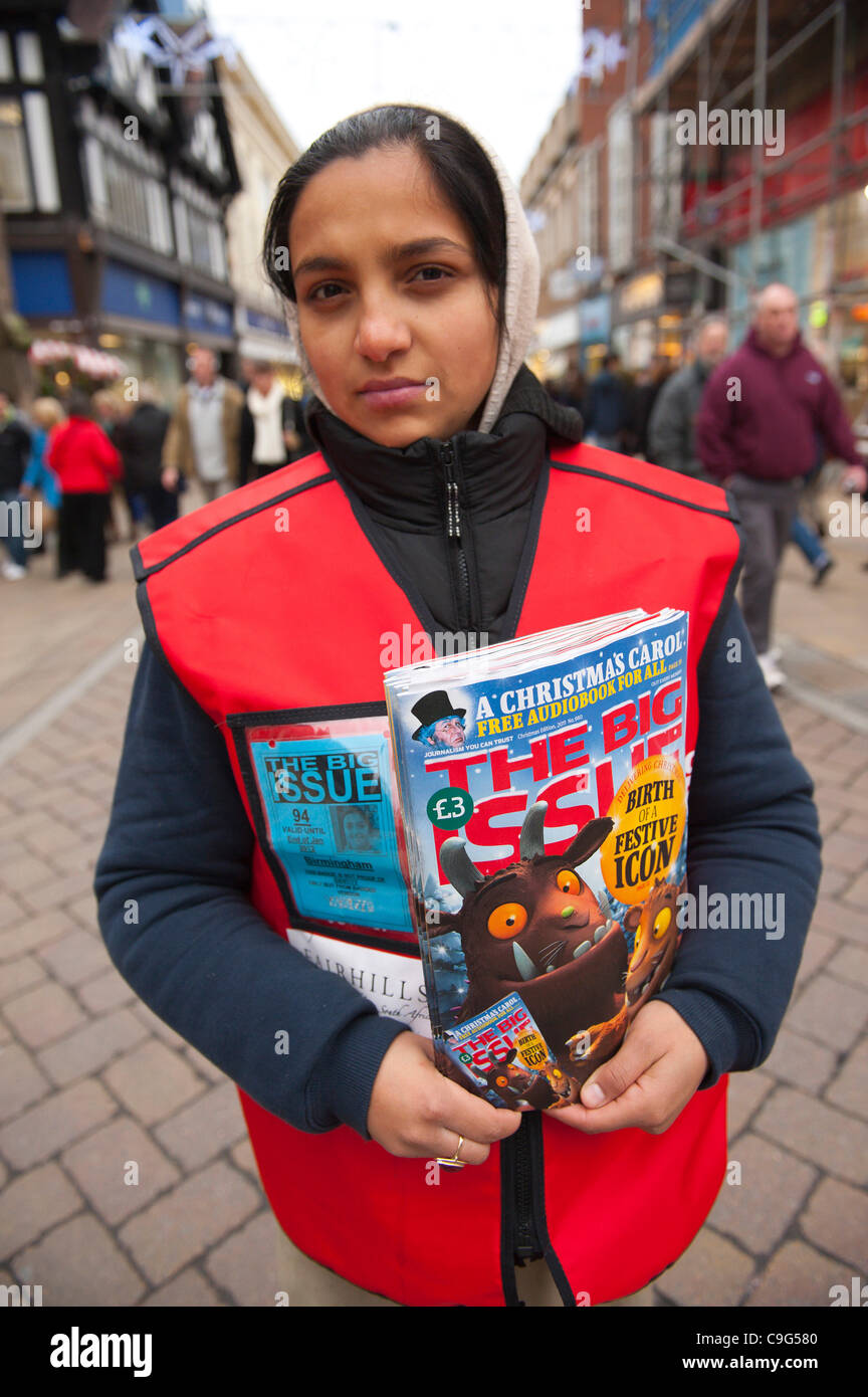 Melissa 23 from Romania homeless and living in Hereford UK for 4 years has only sold three copies of the Big Issue today, she says people are being very careful with their money - Hereford UK 20th december 2011. Photo: Graham M. Lawrence. Stock Photo