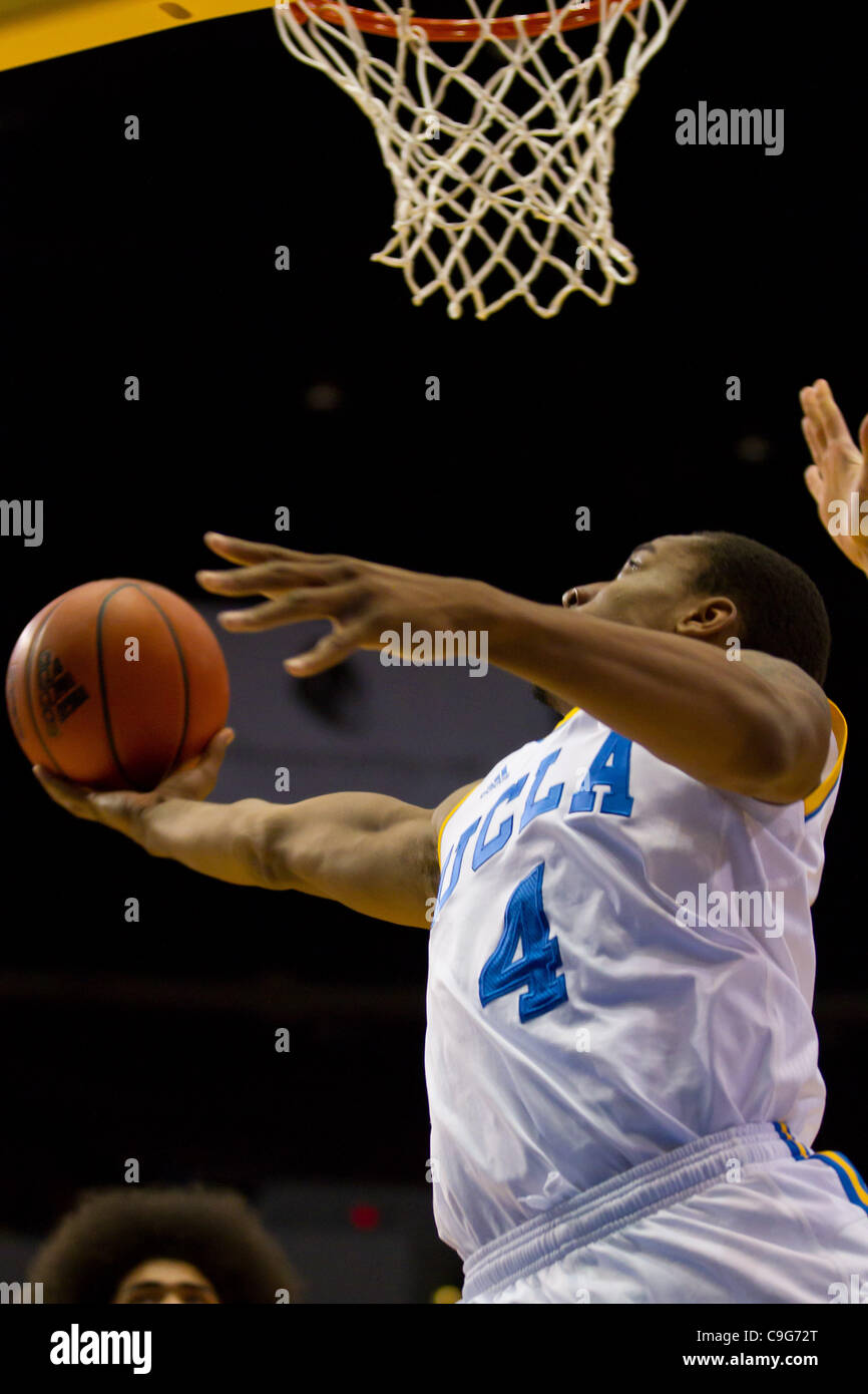 Dec. 20, 2011 - Los Angeles, California, U.S - UCLA Bruins Norman Powell (4) goes under the basket for a layup in first half action.  The UCLA Bruins defeat the UC Irvine Anteaters 89-60. (Credit Image: © Josh Chapel/Southcreek/ZUMAPRESS.com) Stock Photo