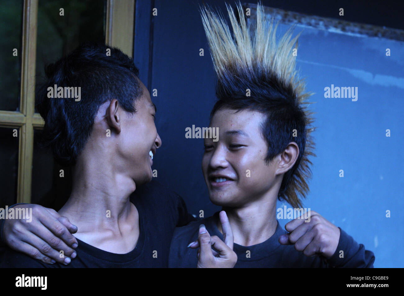 Dec. 22, 2011 - Jakarta, Indonesia - Punk members chat with his friend ...