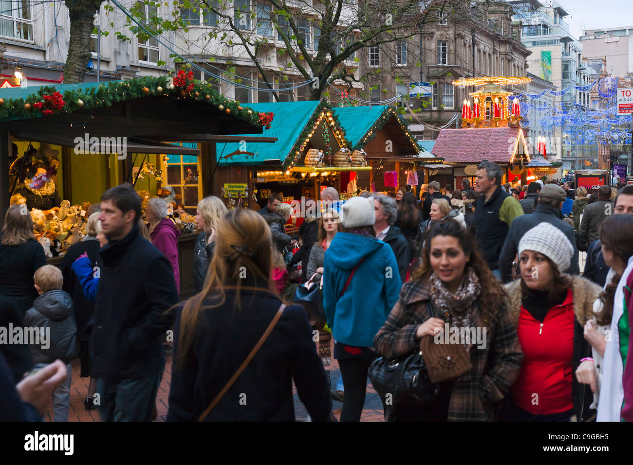 Crowds of last minute Christmas shoppers at the Frankfurt German Christmas Market on New Street, Birmingham, UK. Stock Photo