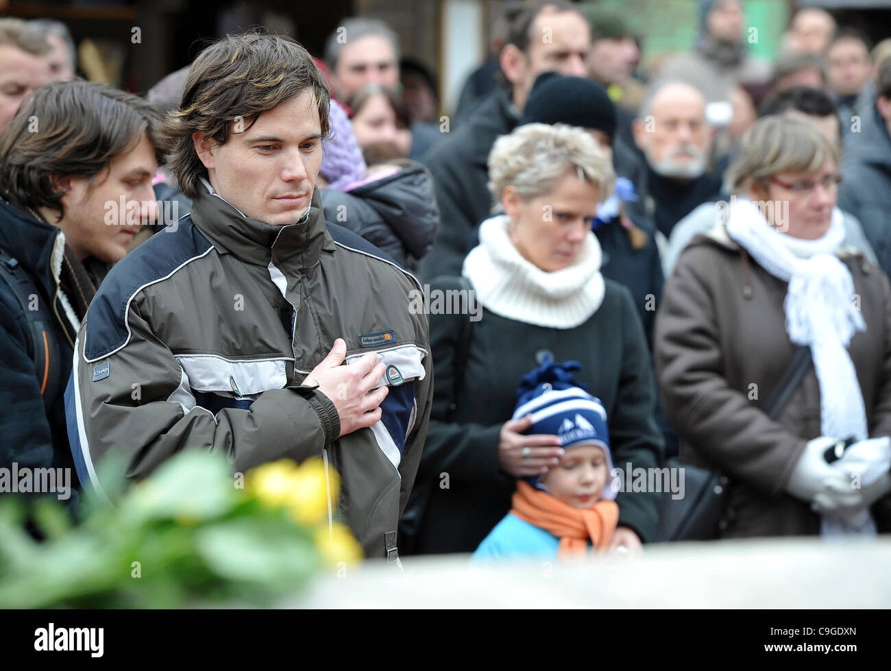 People hold Minute of Silence for former Czech and Czechoslovak President Vaclav Havel in Brno. Funeral of Vaclav Havel took place in the St. Vitus Cathedral at Prague Castle on Friday, Dec. 23, 2011. (CTK Photo/Igor Sefr) Stock Photo