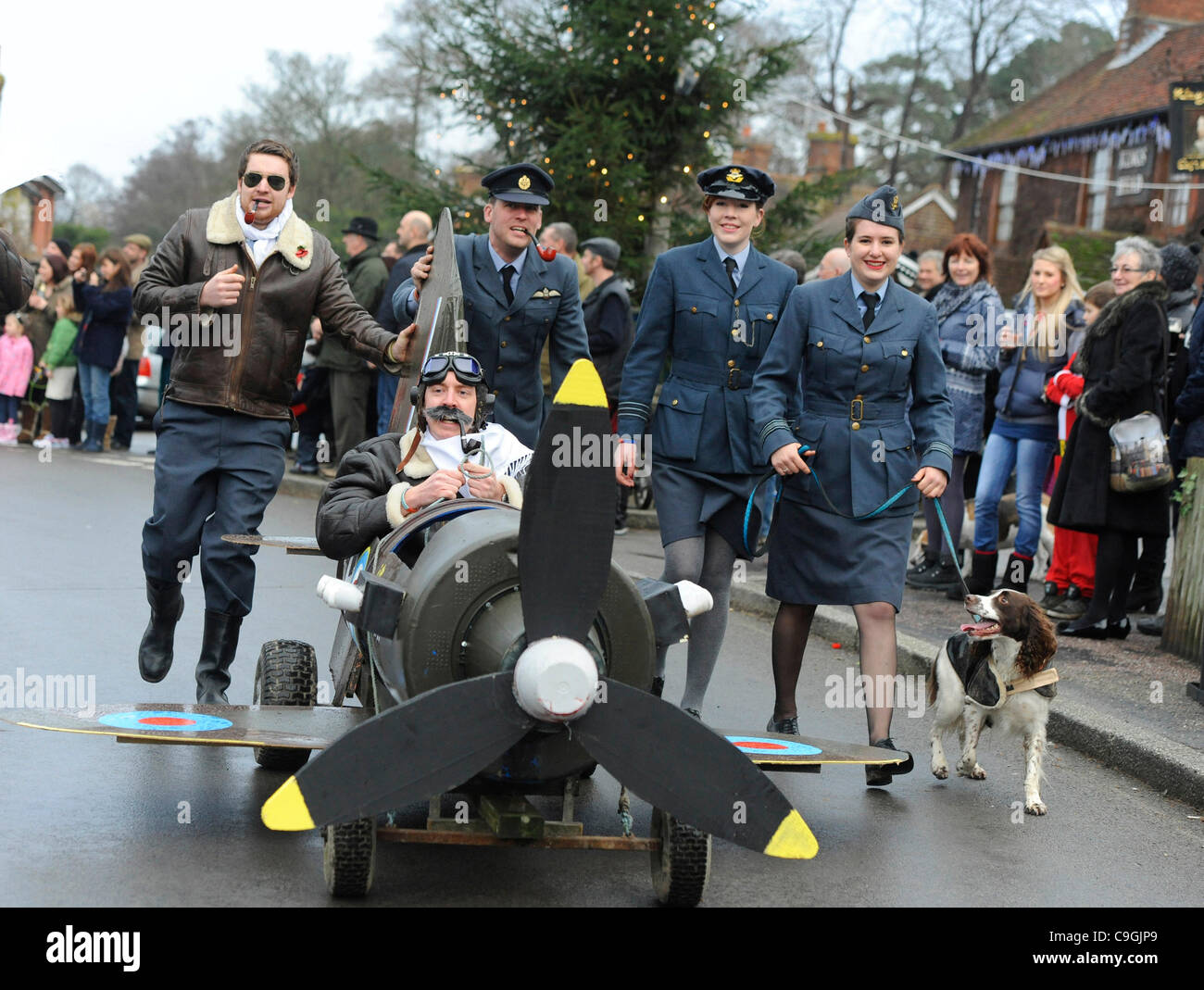 East Hoathly, East Sussex, UK. 26th Dec, 2011. Teams in fancy dress turned out in style for the Boxing Day Pram race in East Hoathly and were cheered on by large crowds. The annual event organised by the Carnival Society raises money for local charities. Credit: Jim Holden/Alamy Live News Stock Photo