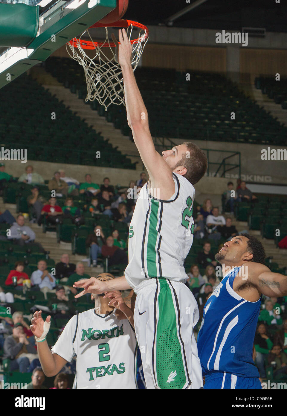 Dec. 27, 2011 - Denton, Texas, United States of America - North Texas Mean Green forward Niko Stojiljkovic (25) in action during the game between the New Orleans Privateers and the University of North Texas Mean Green at the North Texas Coliseum,the Super Pit, in Denton, Texas. UNT defeated UNO 78 t Stock Photo